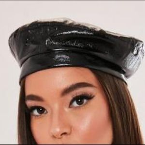 Worn once patent leather beret